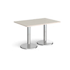 Rectangular table with light grey top and chrome legs on a white background