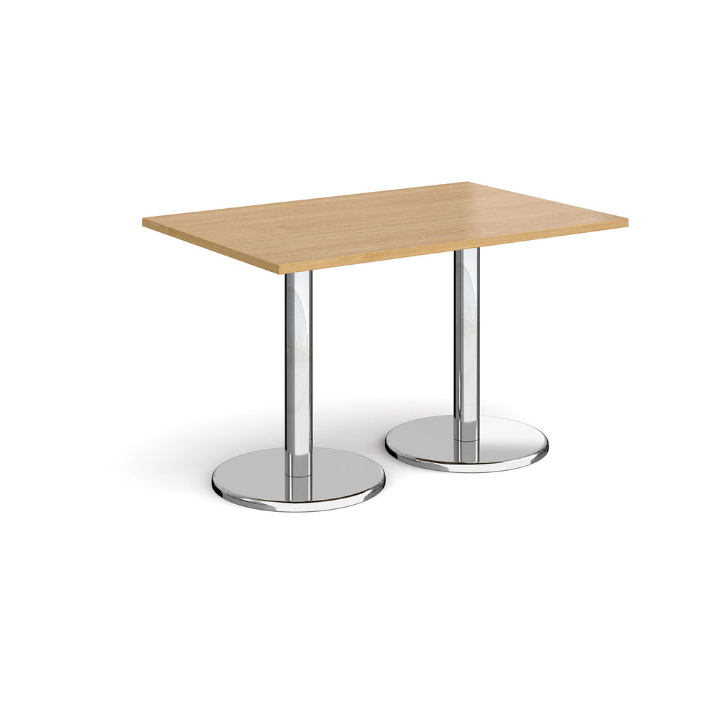Rectangular table with wood-effect top and chrome legs on a white background