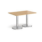 Rectangular table with wood-effect top and chrome legs on a white background