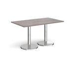 Rectangular table with grey wood-effect top and chrome legs on a white background