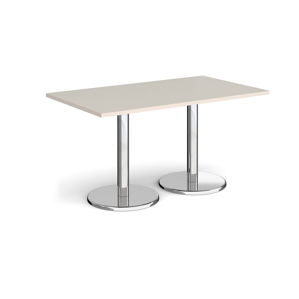 Rectangular table with light grey top and chrome legs on a white background