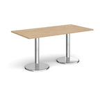 Rectangular table with wood-effect top and chrome legs on a white background