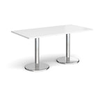 Rectangular table with white top and chrome legs on a white background
