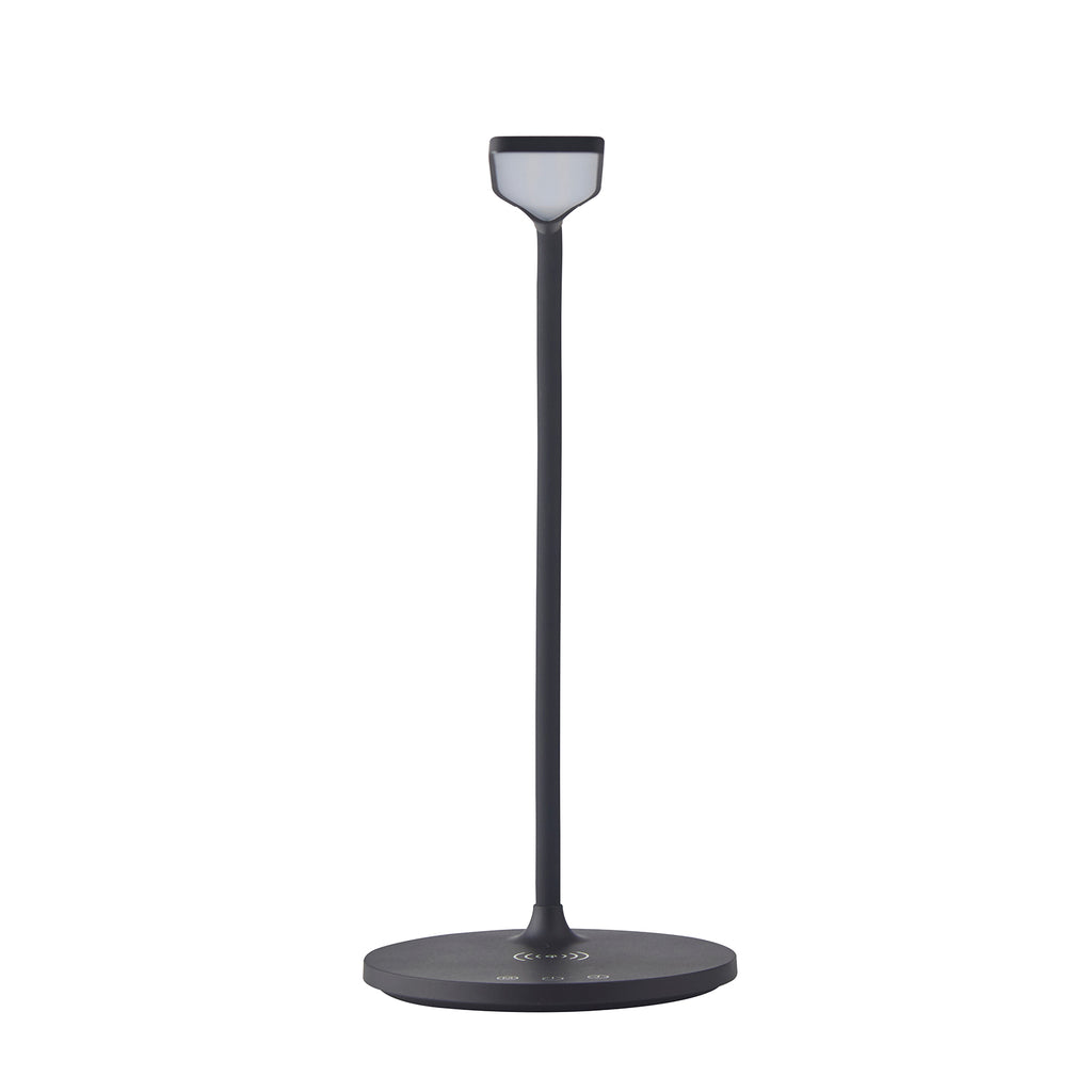 Black adjustable desk lamp on a white background