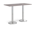 Rectangular poseur table with grey wood-effect top and metal legs on a white background