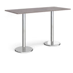 Rectangular poseur table with grey wood-effect top and metal legs on a white background