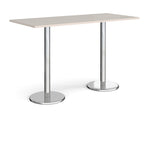 Rectangular poseur table with light grey top and metal legs on a white background