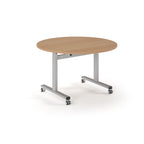 Round table with wood-effect top and metal legs with wheels on a white background