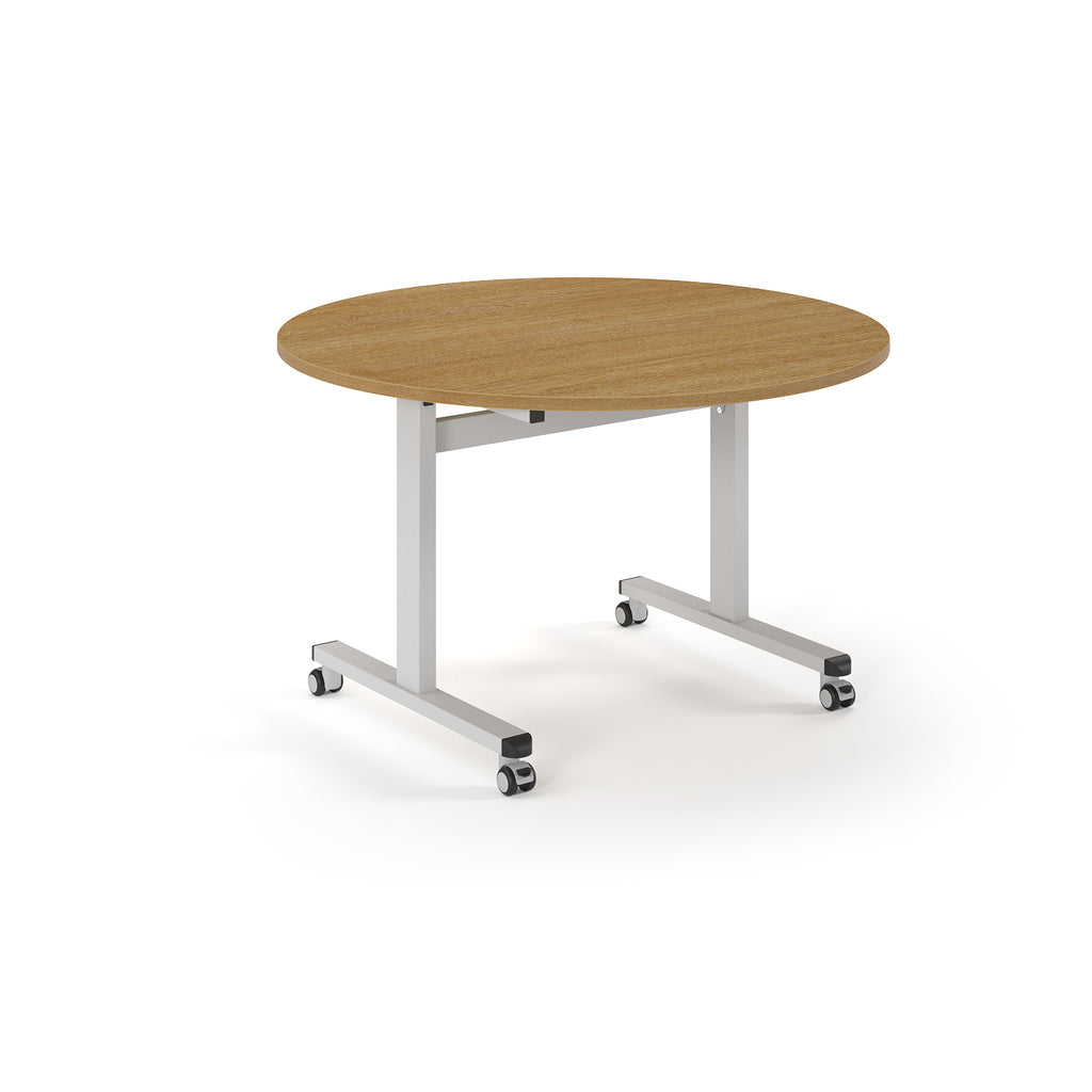 Round table with wood-effect top and  metal legs with wheels on a white background