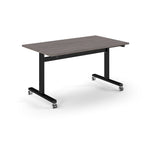 Rectangular table with grey wood-effect top and metal legs with wheels on a white background