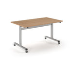 Rectangular table with wood-effect top and metal legs with wheels on a white background