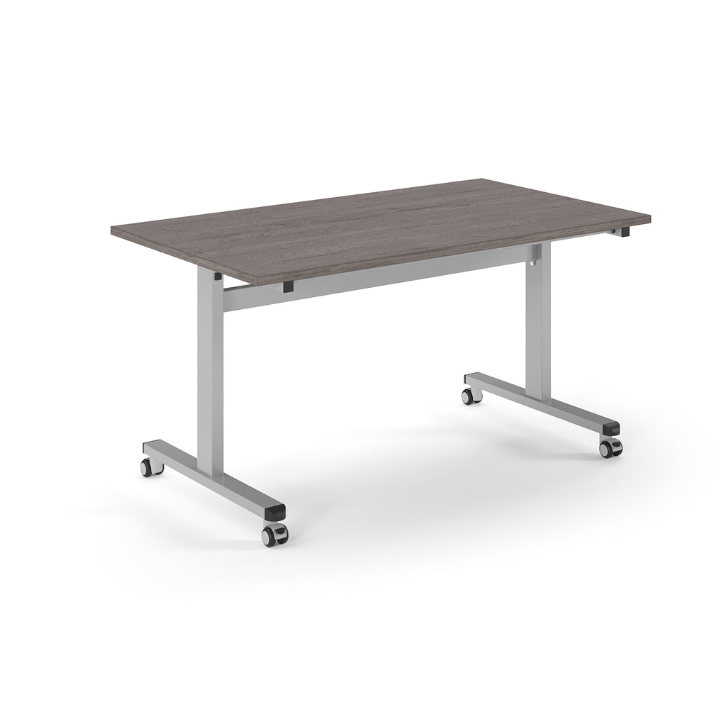Rectangular table with wood-effect top and metal legs with wheels on a white background