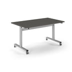 Rectangular table with dark grey top and metal legs with wheels on a white background