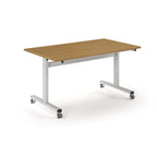 Rectangular table with wood-effect top and metal legs with wheels on a white background