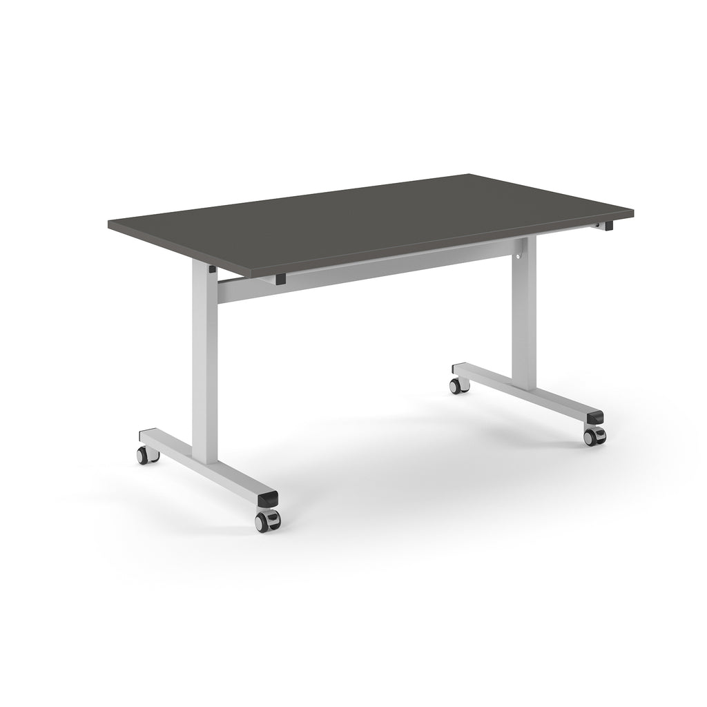 Rectangular table with grey top and metal legs with wheels on a white background