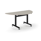 Semi-circular table with light grey top and metal legs with wheels on a white background
