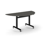 Semi-circular table with grey top and metal legs with wheels on a white background