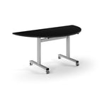 Semi-circular table with black top and metal legs with wheels on a white background