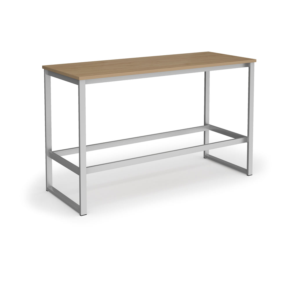 Rectangular high table with a wood-effect top, silver metal frame, and integrated lower support rail, shown on a white background.