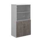 Office storage cupboard with a white carcass, lockable lower grey wood-effect doors, and upper glass display doors with internal shelving, shown on a white background.