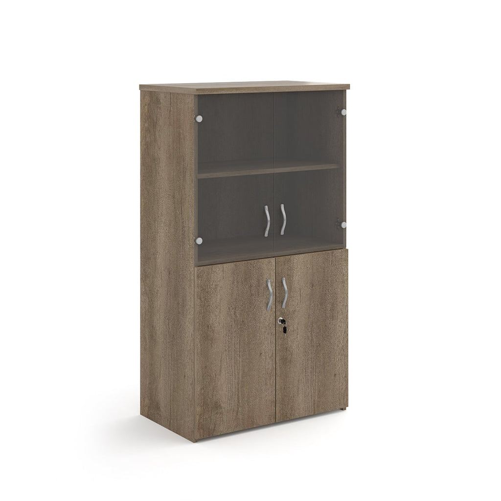 Office storage cupboard with a wood-effect carcass, lockable lower doors, and upper glass display doors with internal shelving, shown on a white background.
