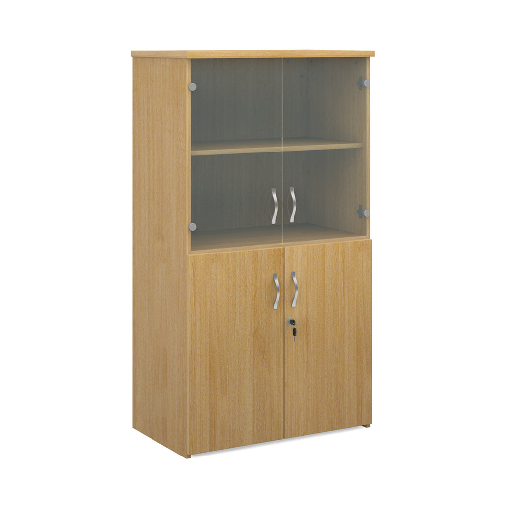 Office storage cupboard with a wood-effect carcass, lockable lower doors, and upper glass display doors with internal shelving, shown on a white background.