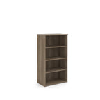 Wooden bookshelf with three shelves on a white background