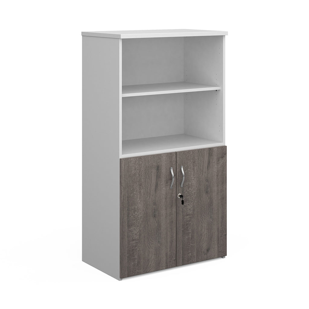 Office storage cupboard with a white carcass, open upper shelving, and lockable lower grey wood-effect doors, shown on a white background.