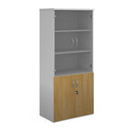 Tall office storage cupboard with a white carcass, lockable lower wood-effect doors, and upper glass display doors with internal shelving, shown on a white background.
