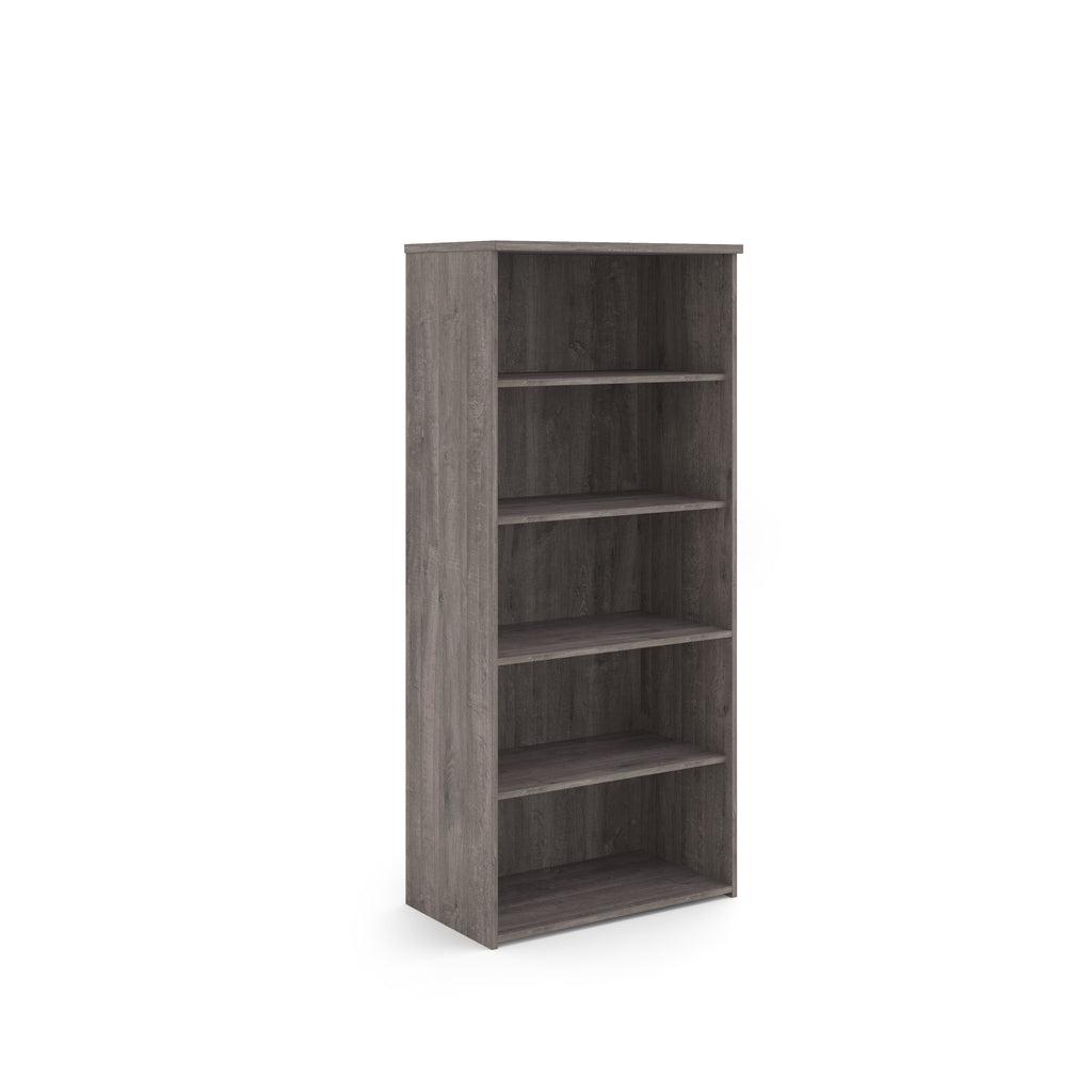 Wooden bookshelf with four shelves on a white background