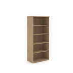 Wooden bookshelf with four shelves on a white background