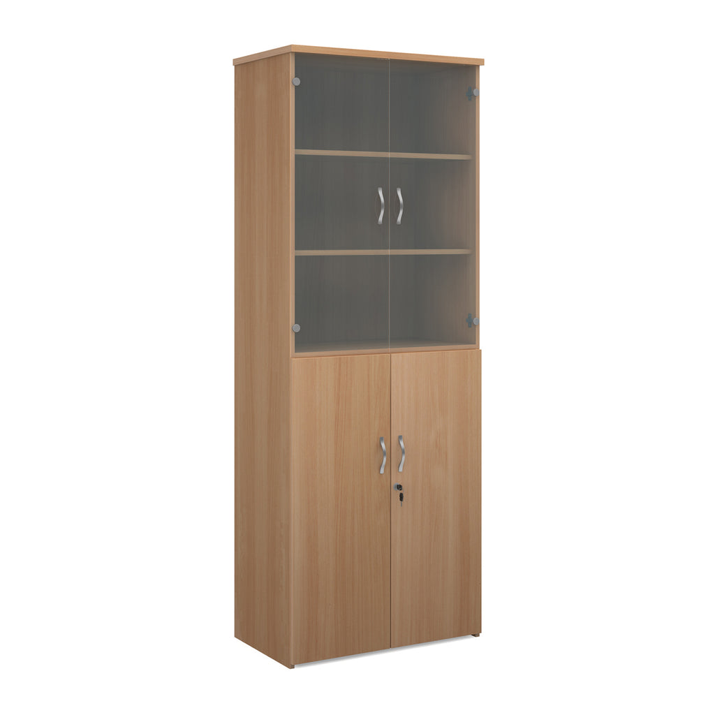 Tall office storage cupboard with a wood-effect carcass, lockable lower doors, and upper glass display doors with internal shelving, shown on a white background.