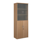 Tall office storage cupboard with a wood-effect carcass, lockable lower doors, and upper glass display doors with internal shelving, shown on a white background.