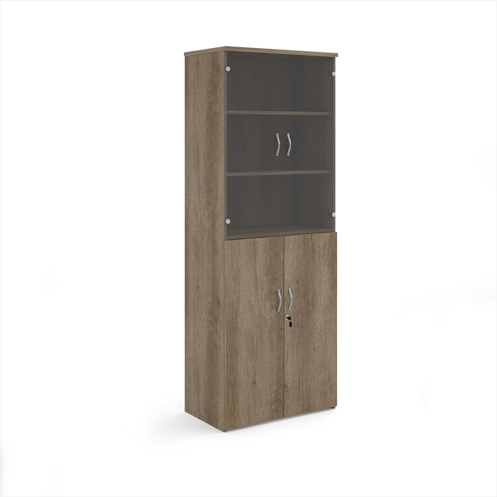 Tall office storage cupboard with a wood-effect carcass, lockable lower doors, and upper glass display doors with internal shelving, shown on a white background.