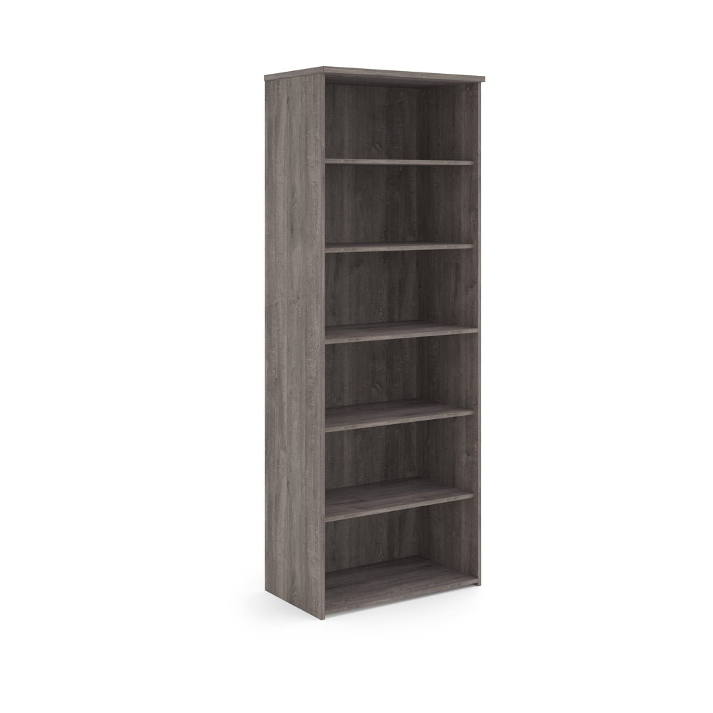Wooden bookshelf with five shelves on a white background