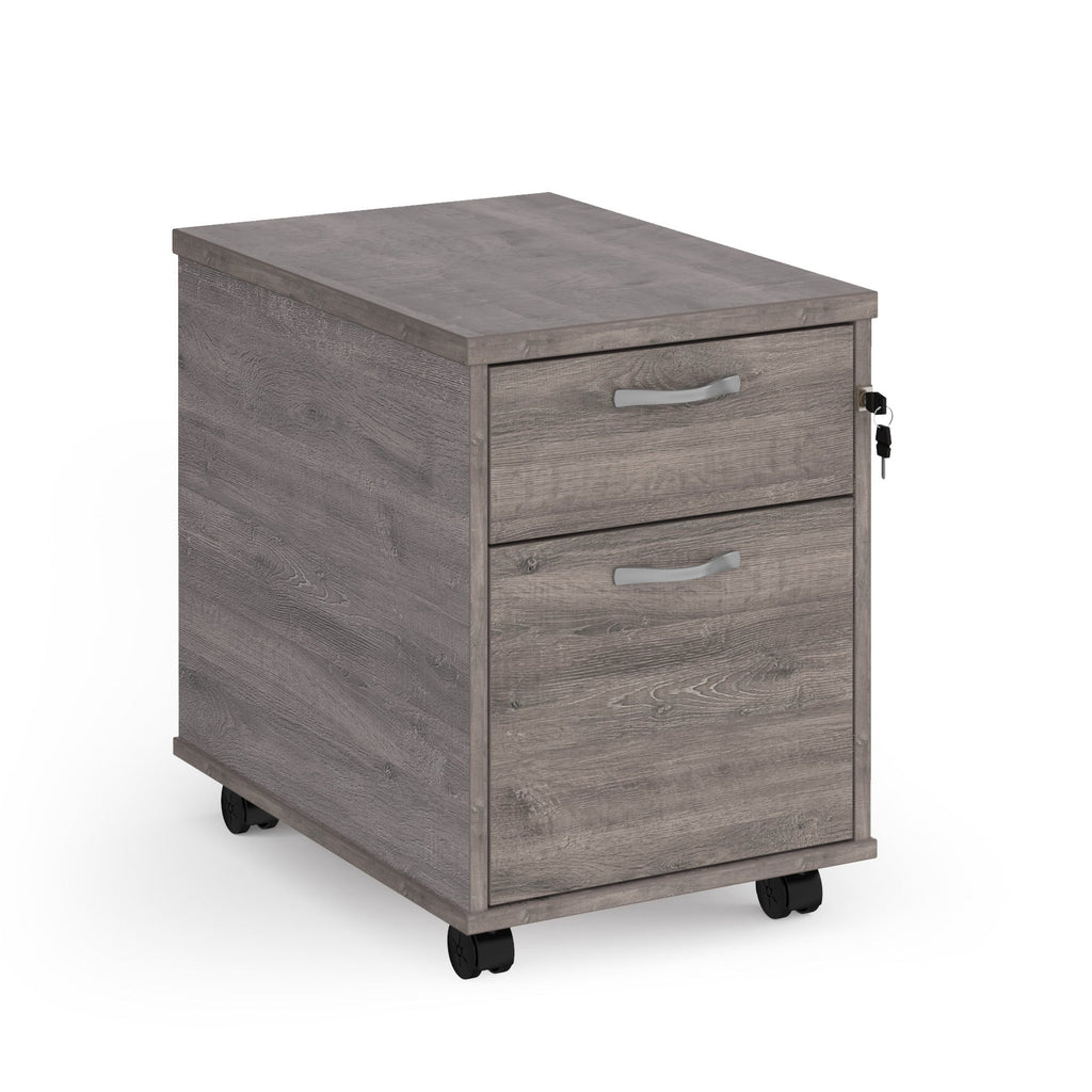 Wooden file cabinet with two drawers on wheels against a white background