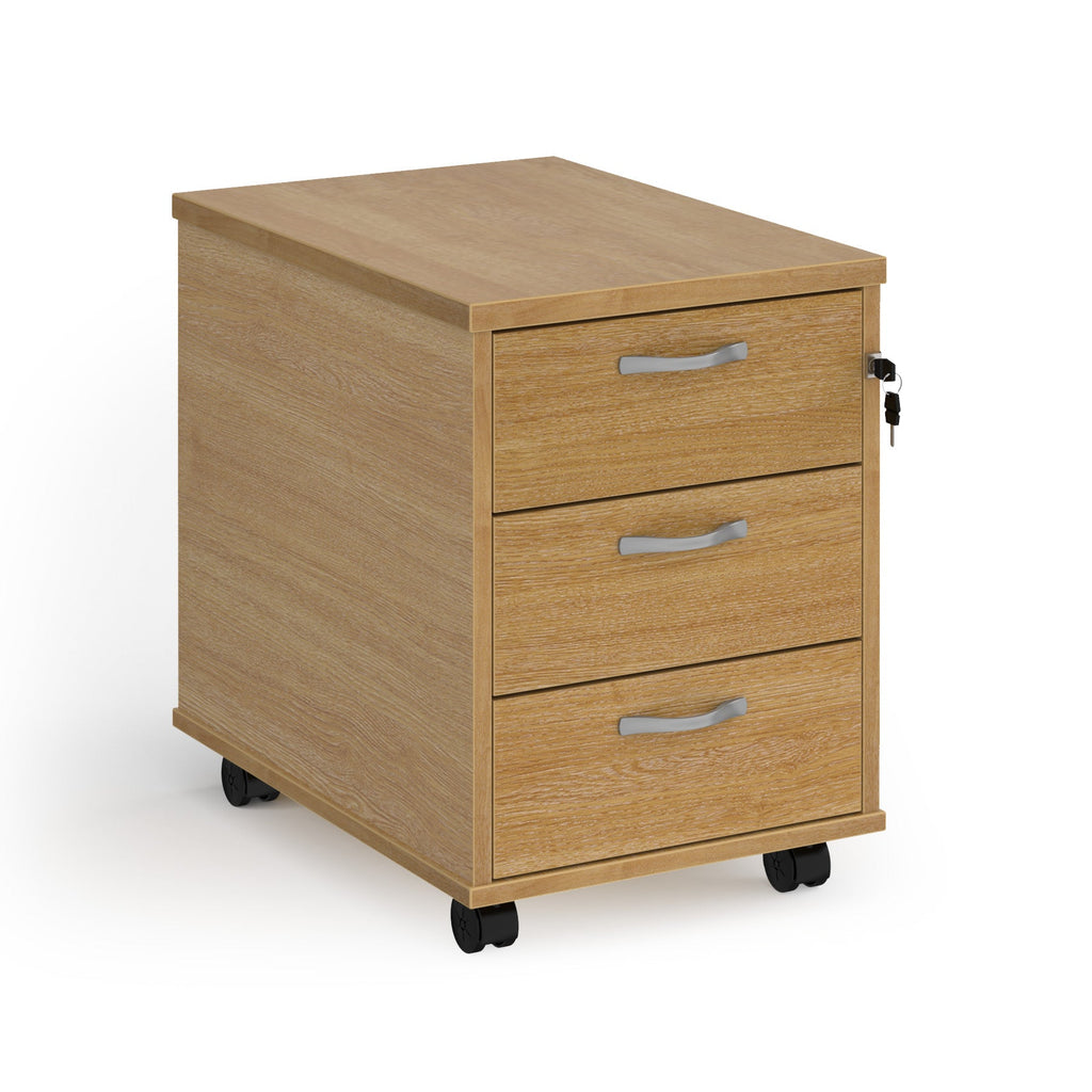 Wooden file cabinet with three drawers on wheels against a white background