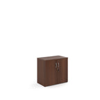 Wooden cabinet with two doors on a white background