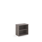 Wooden bookshelf with two shelves on a white background