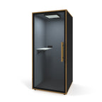 Black single acoustic booth with a table on a white background