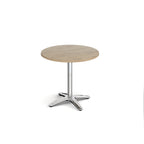 Round wood-effect table with metal base on a white background