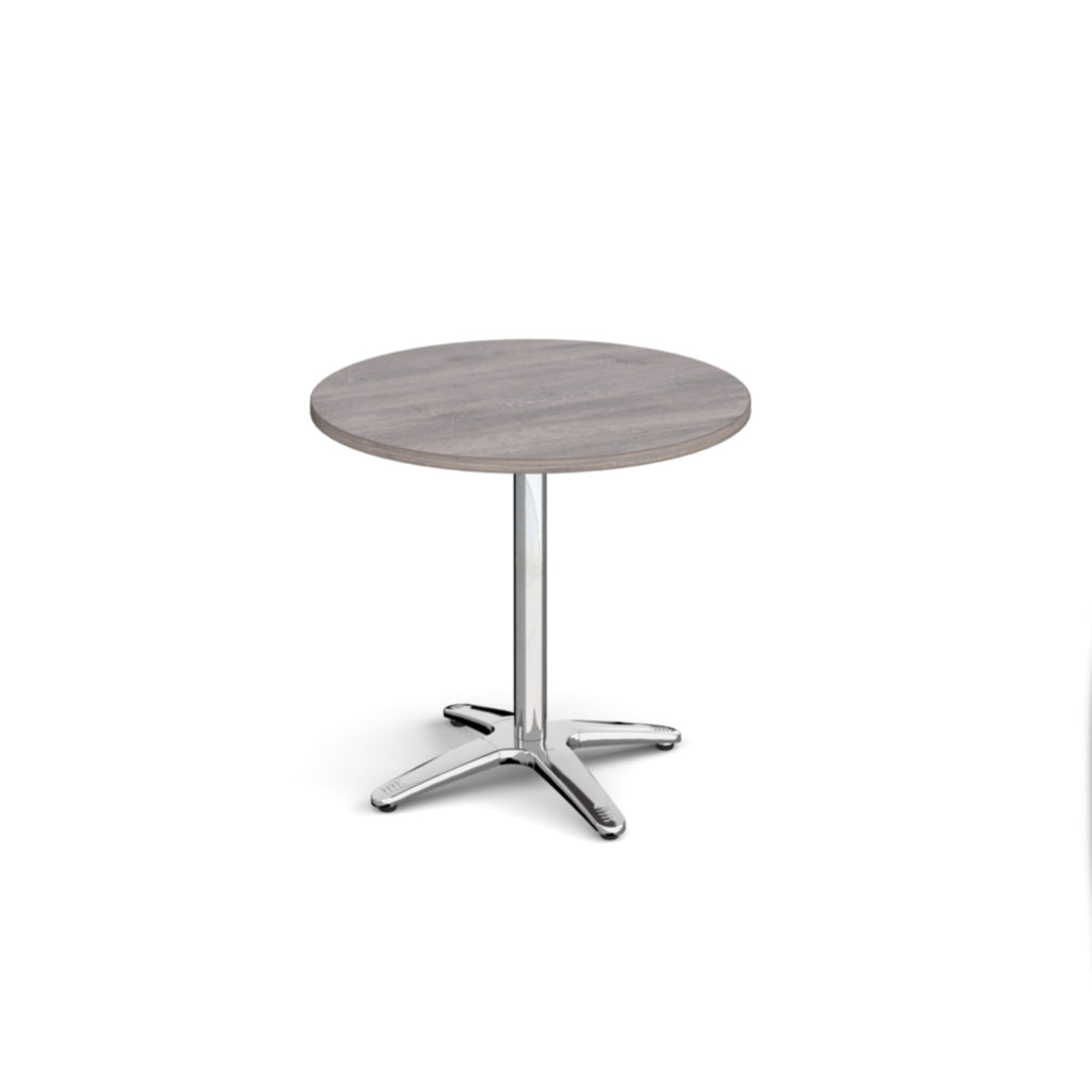 Round wood-effect table with metal base on a white background