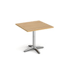 Square table with a wood-effect top and chrome base on a white background