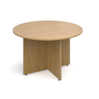 Round meeting table with a light wood-effect finish and panel base support, shown on a white background.