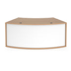 Curved reception desk with a light wood-effect frame, white front panel, and gently contoured worktop, shown on a white background.