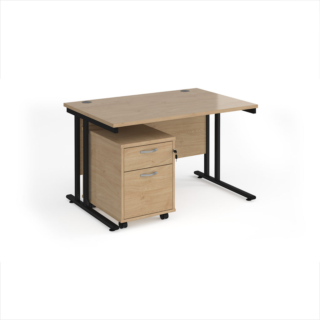 Wooden desk with black legs and a matching pedestal on a white background