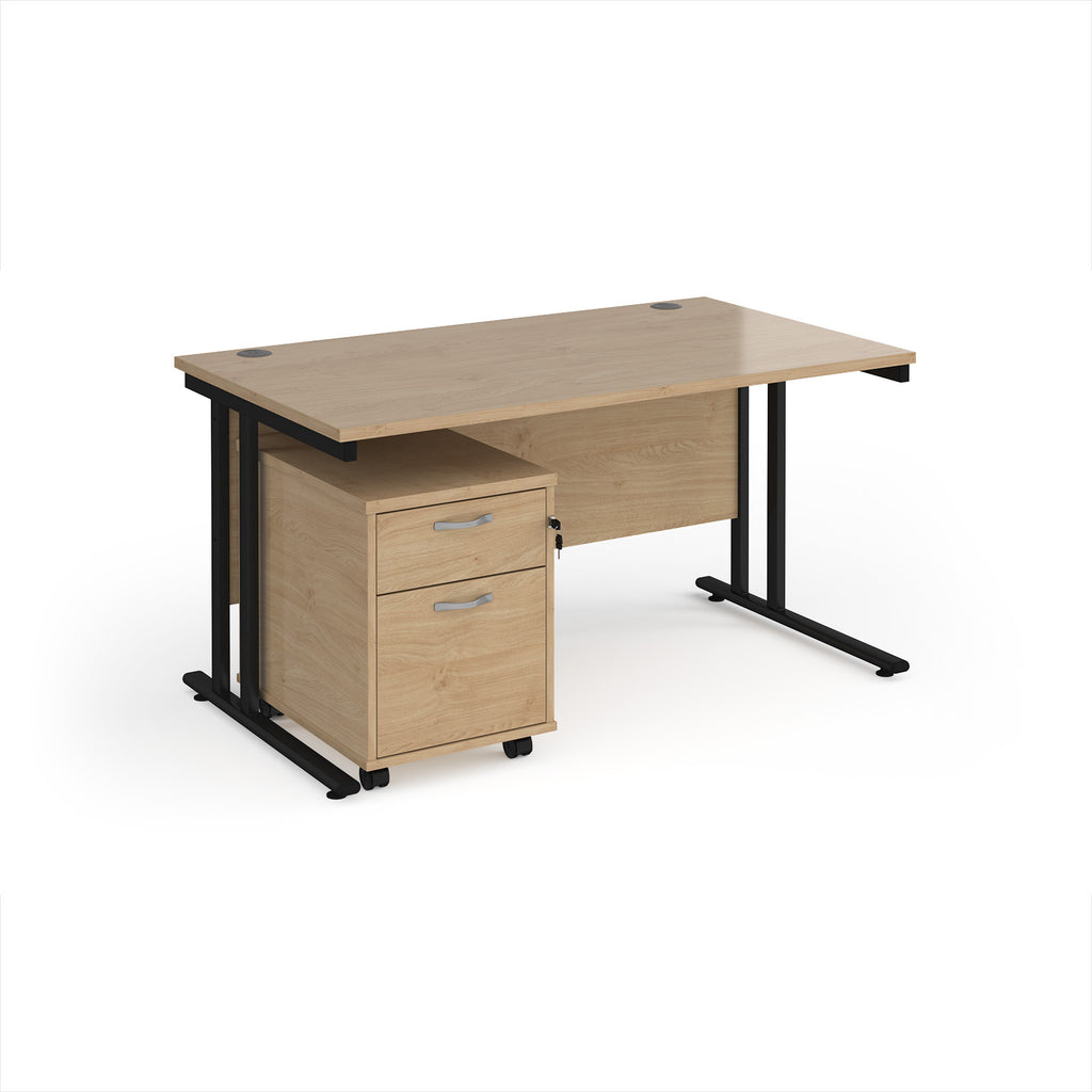 Wooden office desk with black legs on a white background