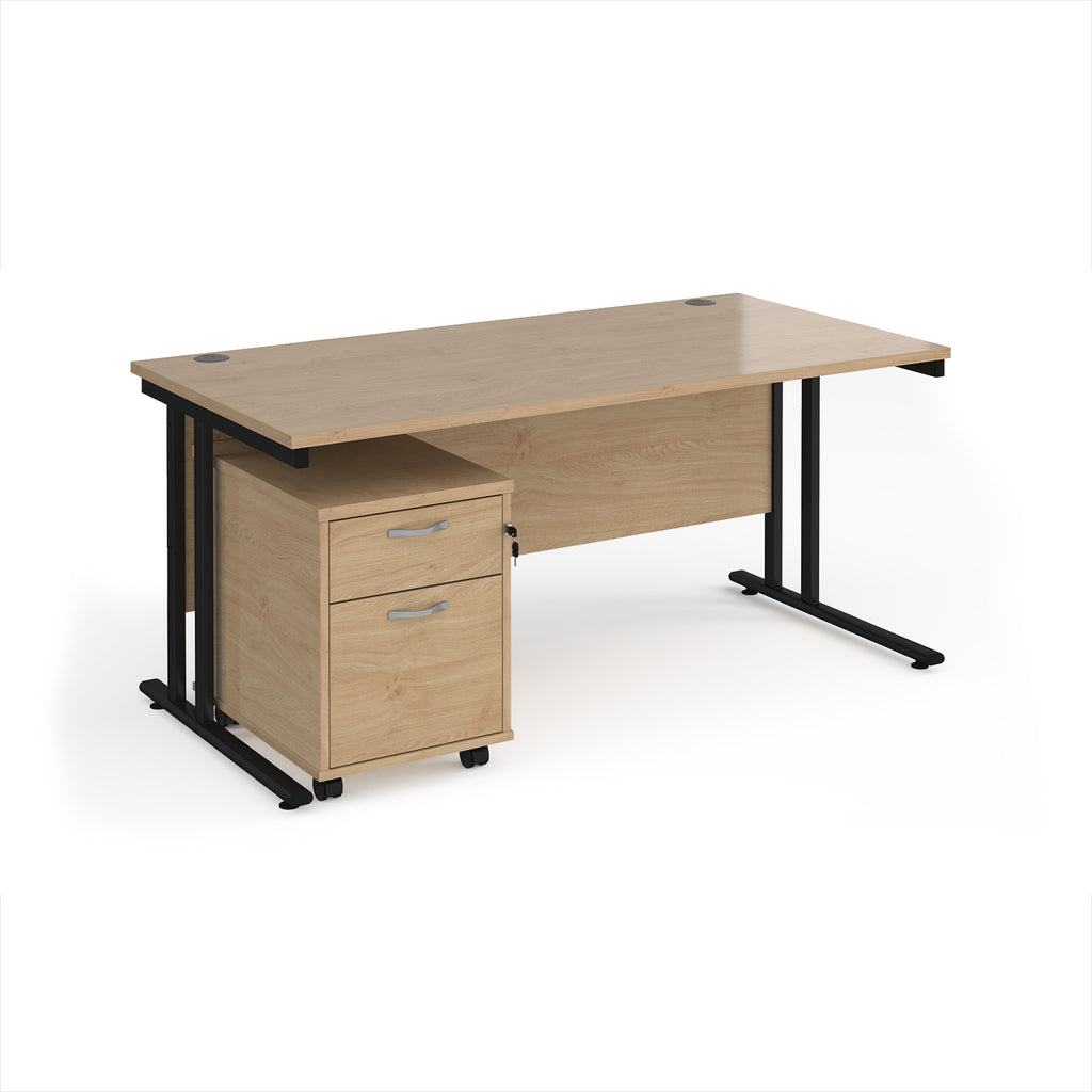 Wooden office desk with black legs and a matching pedestal on a white background