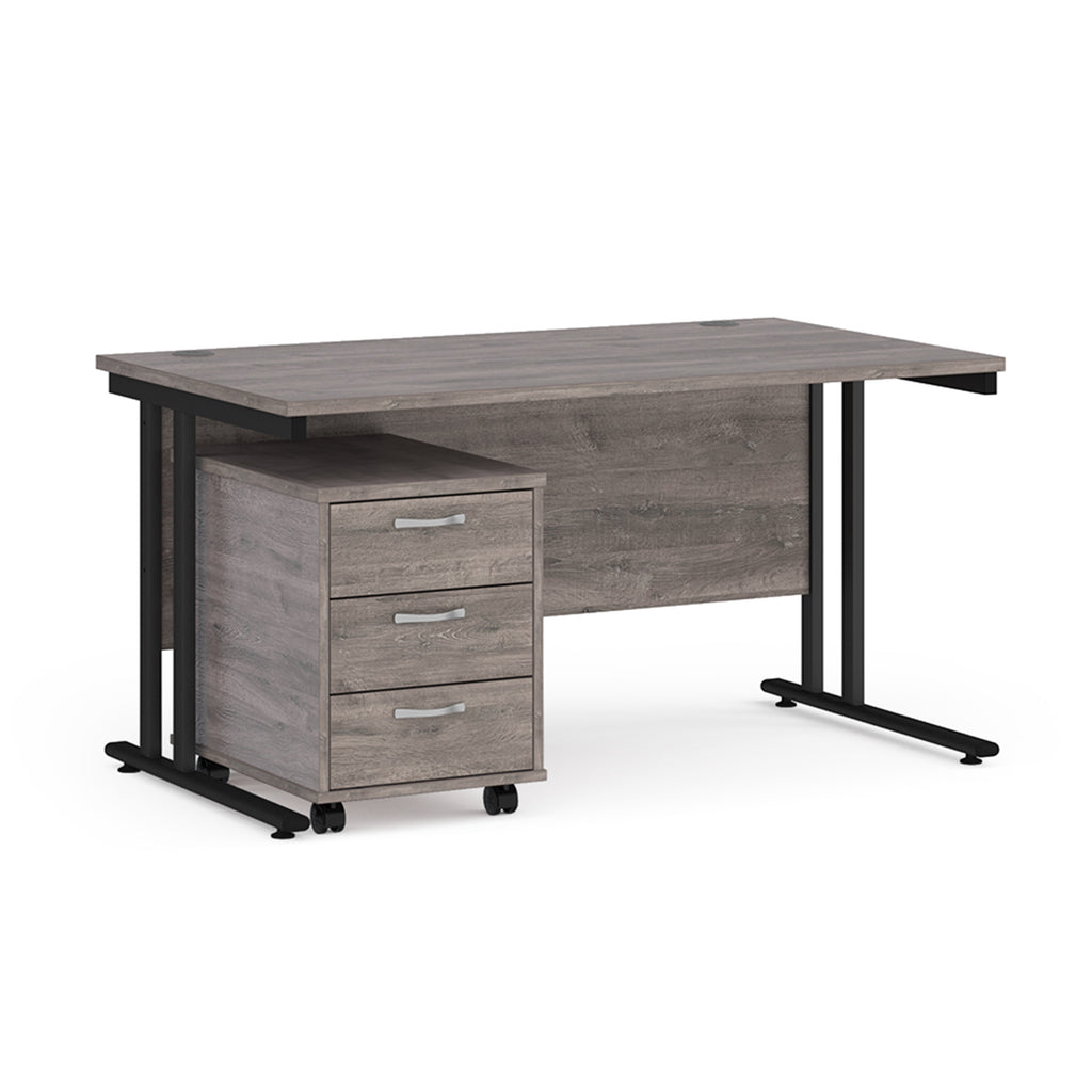 Wooden desk with black metal legs on a white background