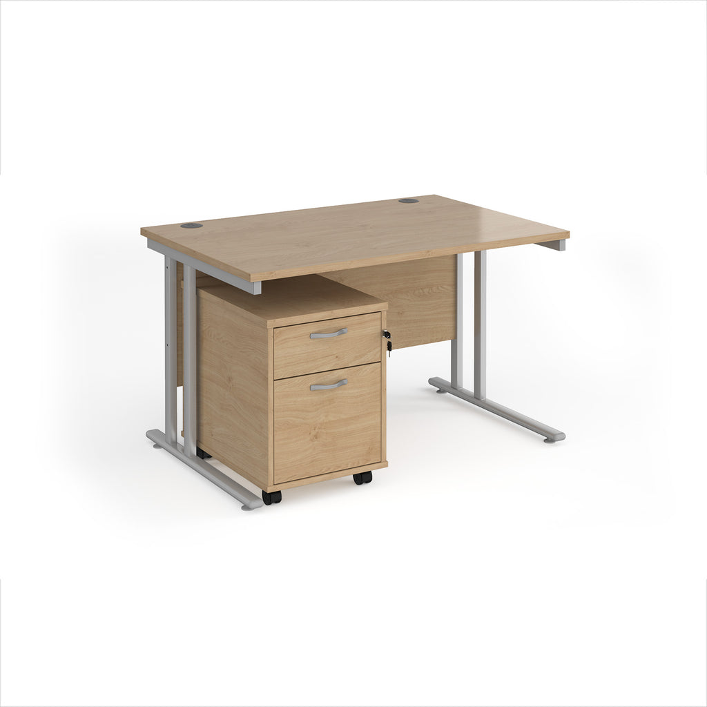 Wooden desk with metal legs and a matching pedestal on a white background